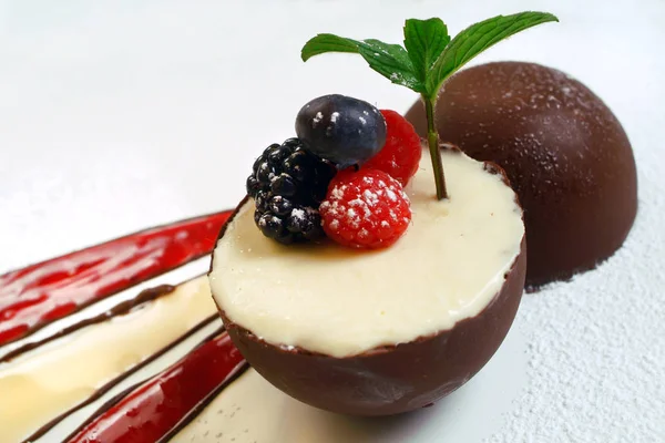 Italian food recipes, chocolate ball with vanilla mousse.