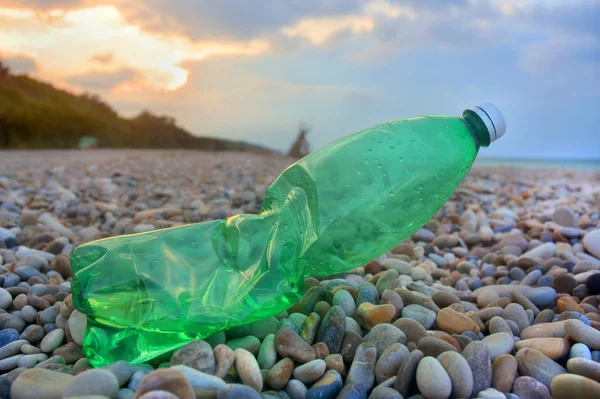 Plastic bottle pollution on a beach.