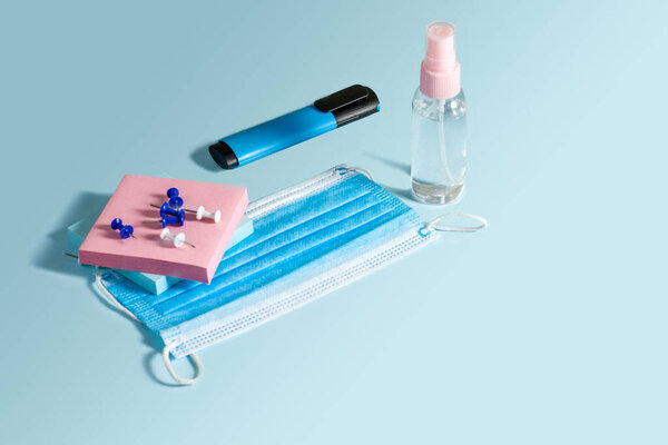 School stationery and medical masks on desk, keep your distance, open school, go back to school for the coronavirus pandemic after being infected 19.