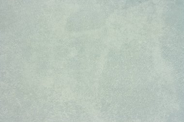 Soyut beton zemin, geometrik dikişsiz desen, pürüzlü duvar, yakın plan. Çatı katı tarzında gri duvar yüzeyi. Alçı beton kaplama.