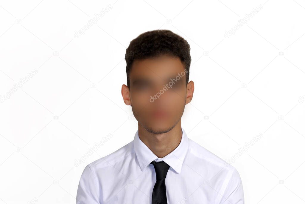 Silhouette of a anonymous young black man in a white shirt and tie on a white background.