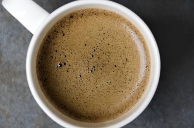 Kahve köpüğü closeup. Kahve beyaz Kupası, üstten görünüm