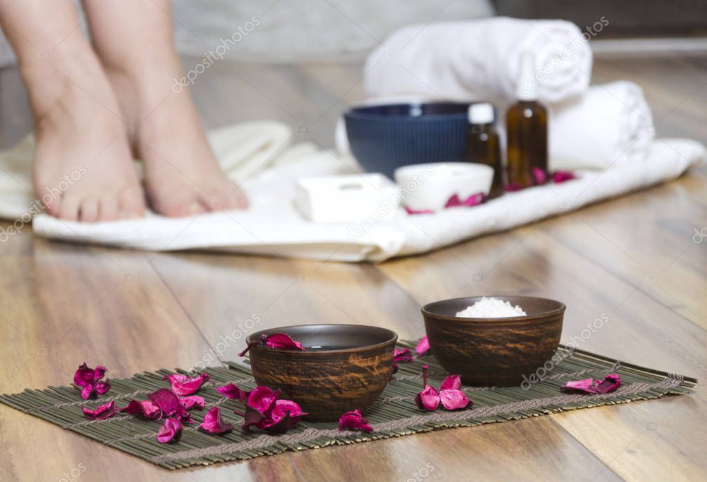 Concept of spa salon therapy. Preparing for pedicure treatments, relaxation mood