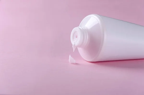 White Tube Cream Squeezed Drop Pink Background Closeup Cosmetic Product — 스톡 사진