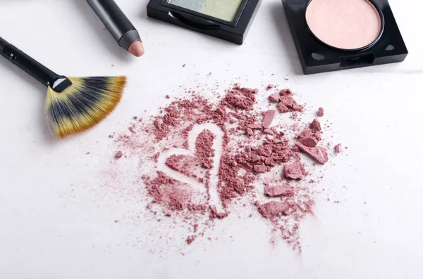 Makeup products, crushed blush powder, heart shape is a symbol of love makeup