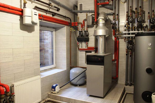 Mini boiler room with a heating system. modern independent heating system in boiler room.