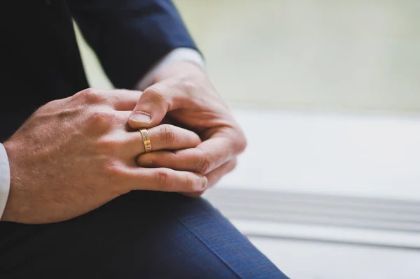 Man Corrects Gold Ring His Finger — Stock Photo, Image