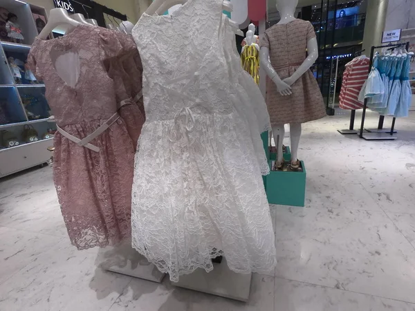 Kids Clothes on mannequin displayed for sale in a mall in Dubai. — Stock Photo, Image