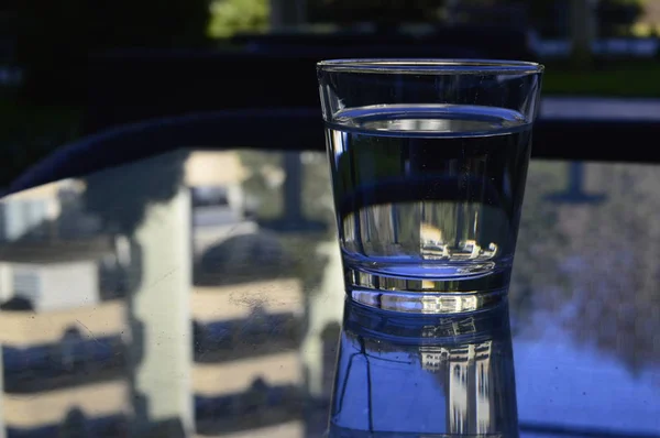 Vaso de agua y vino Imagen de archivo