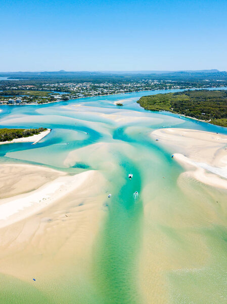 Noosa River and Noosa spit aerial view with vibrant blue water on the Sunshine Coast in Queensland, Australia
