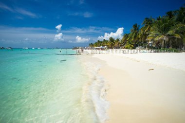 An idyllic beach on Isla Mujeres, Cancun, Mexico clipart