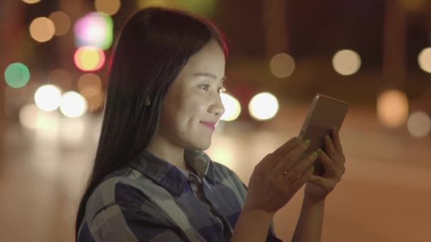 Young Asian Woman Using Tablet Night Road — 비디오