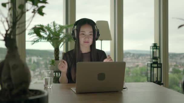 Young Asian Woman Watching Music Video Laptop Dancing Home — Stock Video