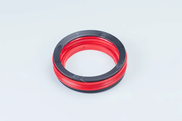 Compaction. Hydraulic cylinder. Seals, sealing rings. Wipers, guide rings, protective rings. Polyurethane — Stock Photo, Image