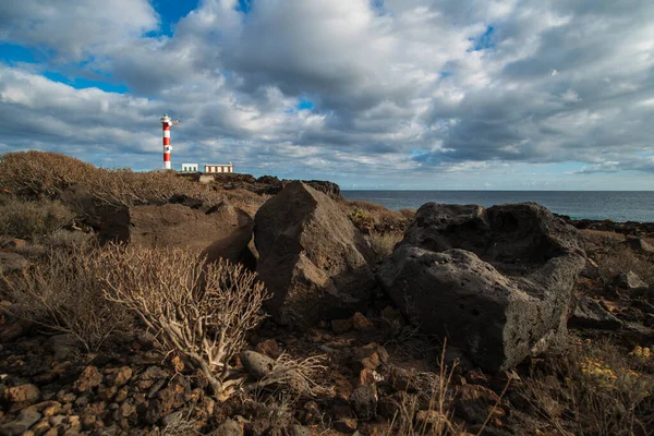 Punta Abona lighthouse. Landscape overlooking the ocean. Sunset. The water is shiny. Tenerife Island, Spain — Stock Photo, Image