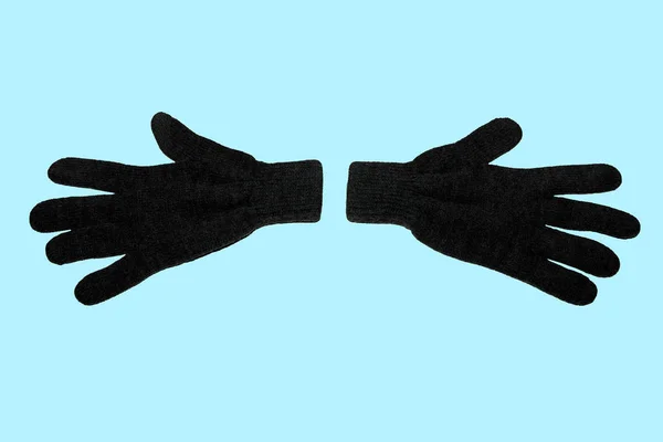 Pair Grey Winter Knitted Gloves Horizontally Blue Background View Top — Stok fotoğraf