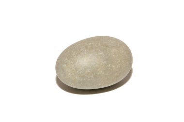 A small gray stone of elongated shape. Isolated on white background.