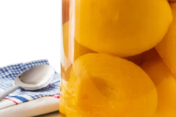 Peach Canned Glass Jar White Background Closeup — Stock Photo, Image