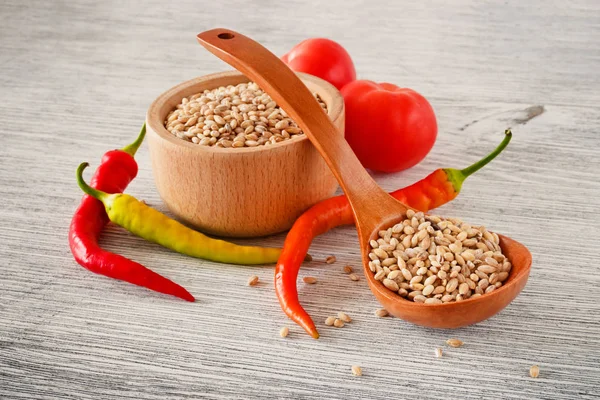 Pearl Barley Wooden Bowl Spoon Well Chili Peppers Tomatoes Wooden — Stock Photo, Image