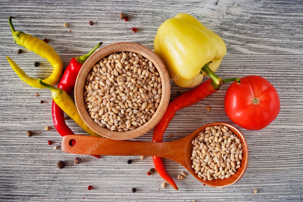 Pearl Barley Wooden Bowl Spoon Well Chili Peppers Tomatoes Wooden — Stock Photo © pilotL39 #211511838 Pearl Barley Wooden Bowl... 