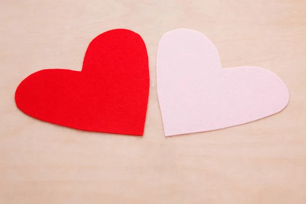 Two Felt Forms Heart Wood Table — Stock Photo, Image