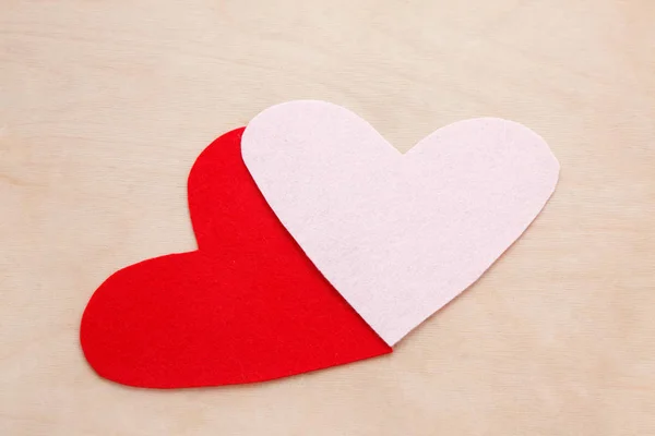 Two Felt Forms Heart Wood Table — Stock Photo, Image