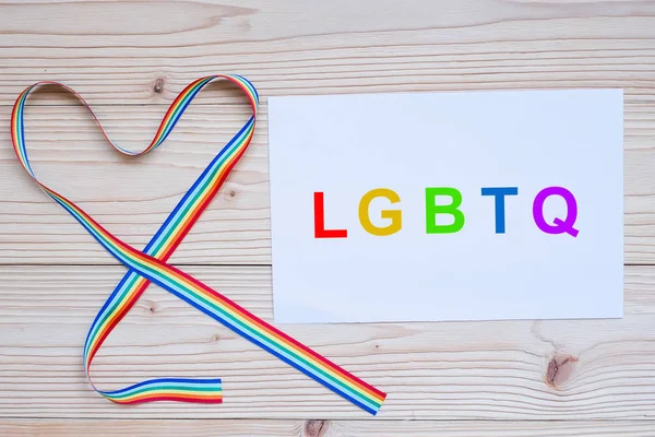 LGBTQ word with heart shape Rainbow ribbon for Lesbian, Gay, Bis