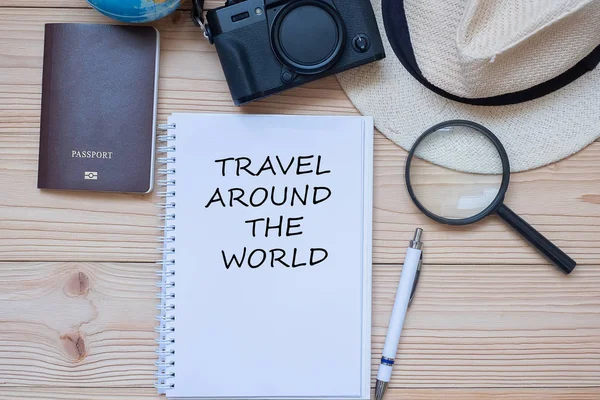 Travel around the Word word on notebook with accessories, Camera — Stock Photo, Image