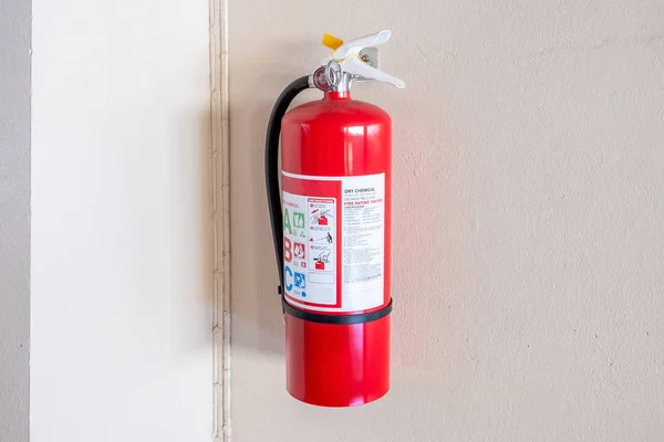 Fire extinguisher system on the wall background, powerful emerge