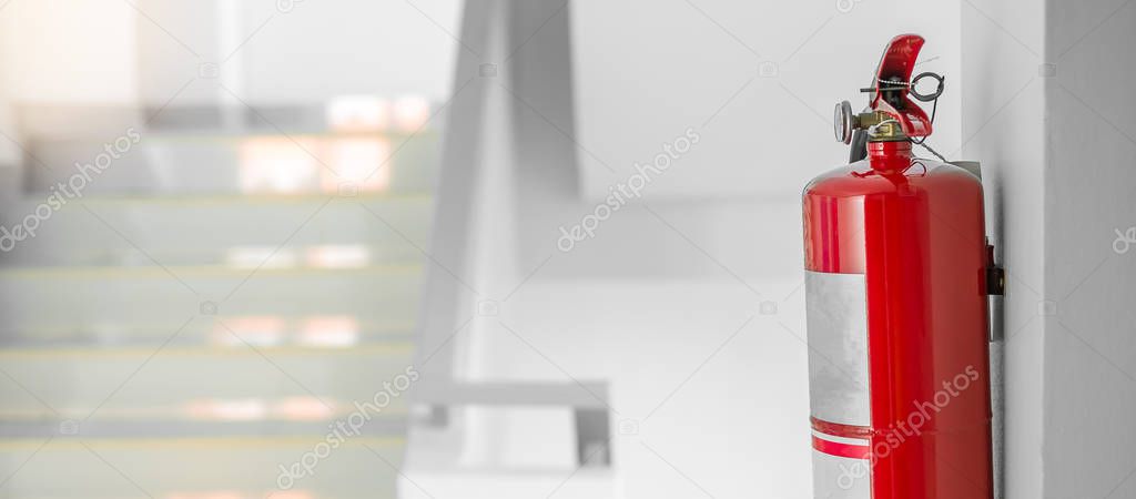 Fire extinguisher system on the wall background, powerful emerge