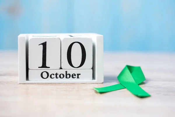 World Mental Health Day, October 10 of white calendar and Green