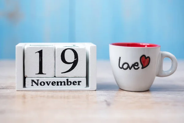 coffee cup, Black mustache and 19 November Calendar.  in the morning. Father, International men day, Prostate Cancer Awareness and World cancer day concept