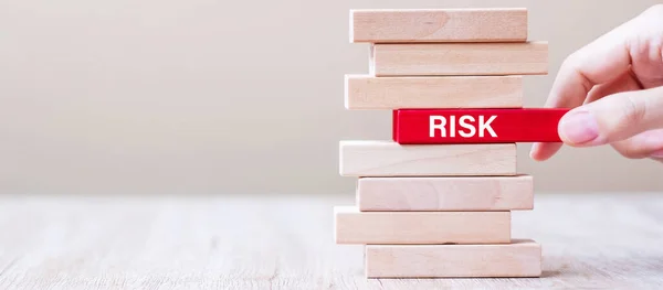 Businessman Hand Placing Pulling Wooden Block Risk Word Tower Business — Stock Photo, Image