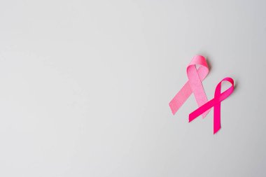 Ekim Kanser Farkındalığı Ayı, Pembe Kurdele Gri Arkaplan Yaşayan ve Hastalıkları Desteklemek İçin. Uluslararası Kadınlar, Anne ve Dünya Kanser Günü Konsepti