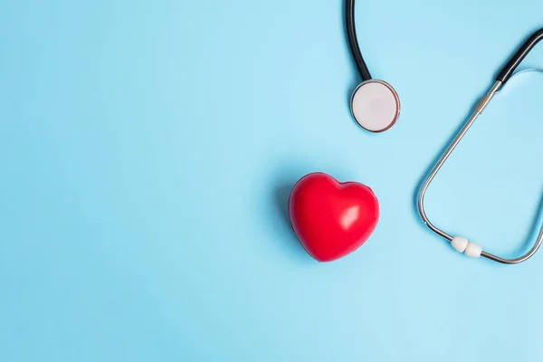 Top View Stethoscope Red Heart Shape Blue Background Copy Space — Stock Photo, Image