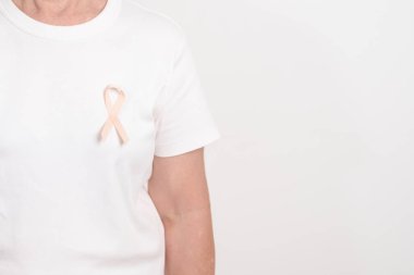 Eylül ayı için Şeftali Kurdeleli yaşlı kadın Uterin Kanser Bilinci Ayı, Endometrial Kanser, Jinekoloji, Rahim ve Yumurtalıklar, Endometriyozis, Haziran Vajinal Kanser ve Dünya Kanser Günü Konsepti