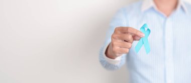 Mavi kurdeleli adam mavi kasım, kasım prostat kanseri farkındalık ayı, dünya diyabet günü, erkek sağlığı ayı, uluslararası erkekler, babalar günü. Sağlık ve Dünya Kanser Günü