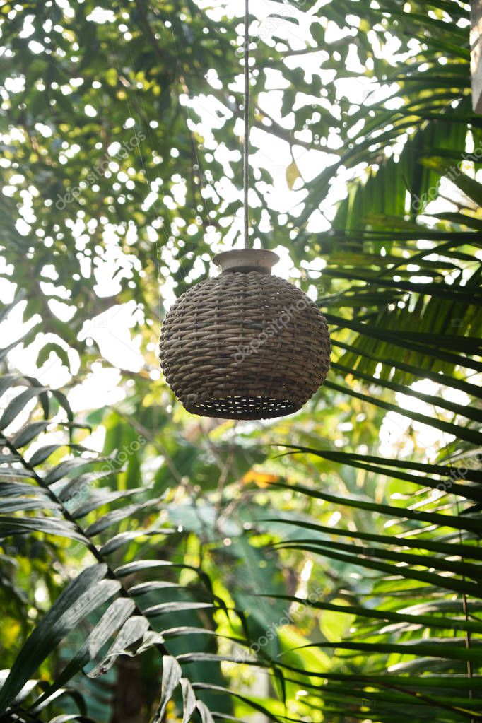 Wicker lamp hand-made. House in the tropics.