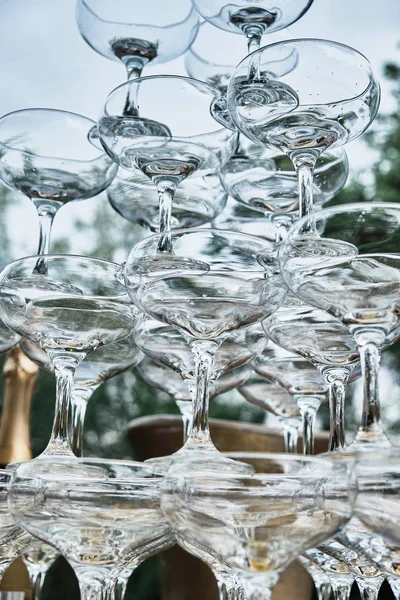 Pyramid of crystal glasses. Close-up