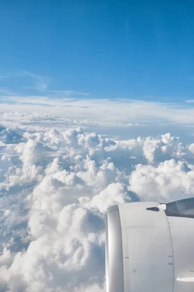 View of the clouds from the window of the plane