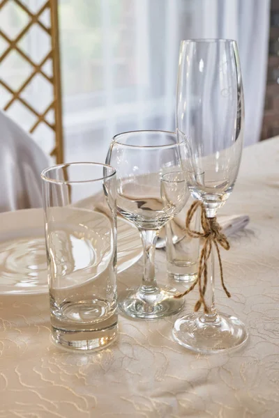 Crystal glassware. Glasses for wine, champagne and juice. Close up