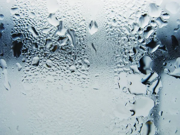 Large drops of water on the window — Stock Photo, Image