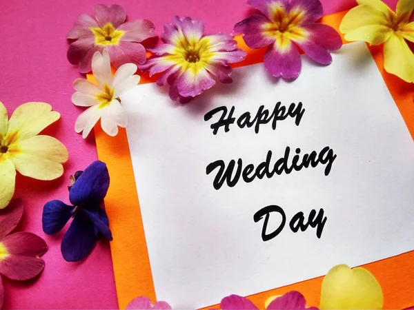 The inscription Happy Wedding Day with flowers on a colored background — Stock Photo, Image