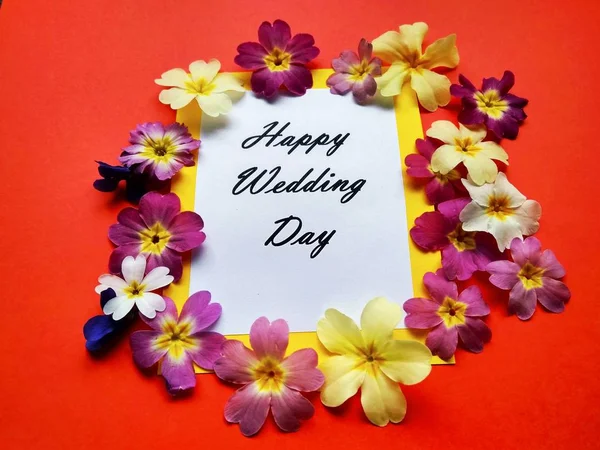 The inscription Happy Wedding Day with flowers on a colored background — Stock Photo, Image