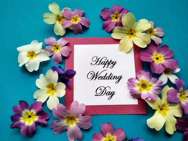 The inscription Happy Wedding Day with flowers on a colored background — Stock Photo, Image