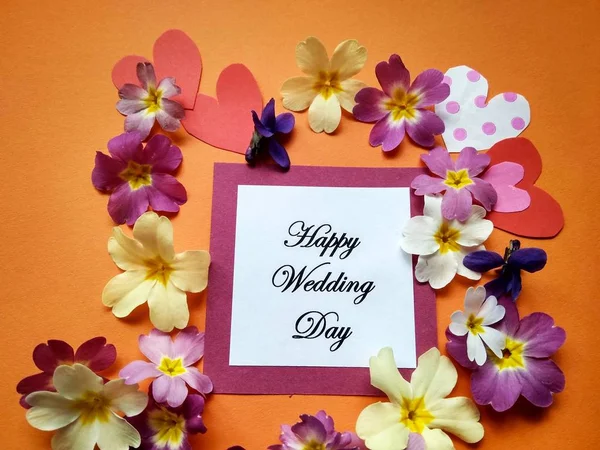 The inscription Happy Wedding Day with flowers on a colored background — Stock Photo, Image