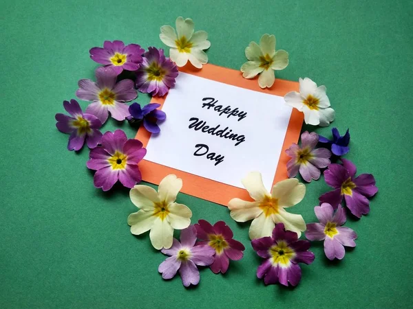 The inscription Happy Wedding Day with flowers on a colored background — Stock Photo, Image