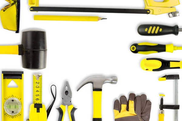 Collection d'outils de construction sur fond blanc en forme de fra — Photo