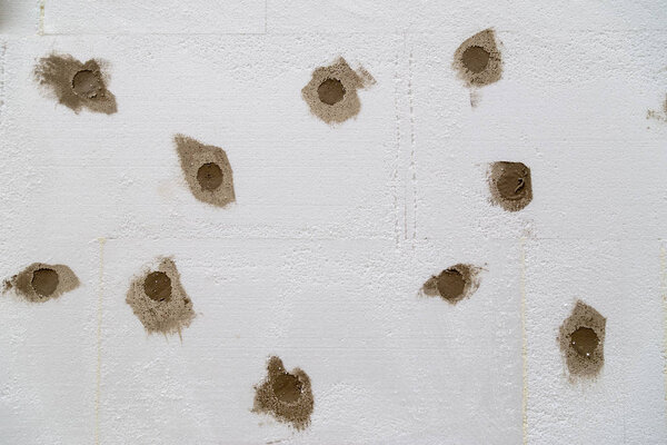 Foam plastic board styrofoam on a building wall for better insul