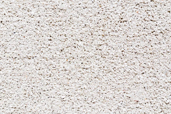 Granito bianco briciole decorativo stucco parete texture sfondo . — Foto Stock